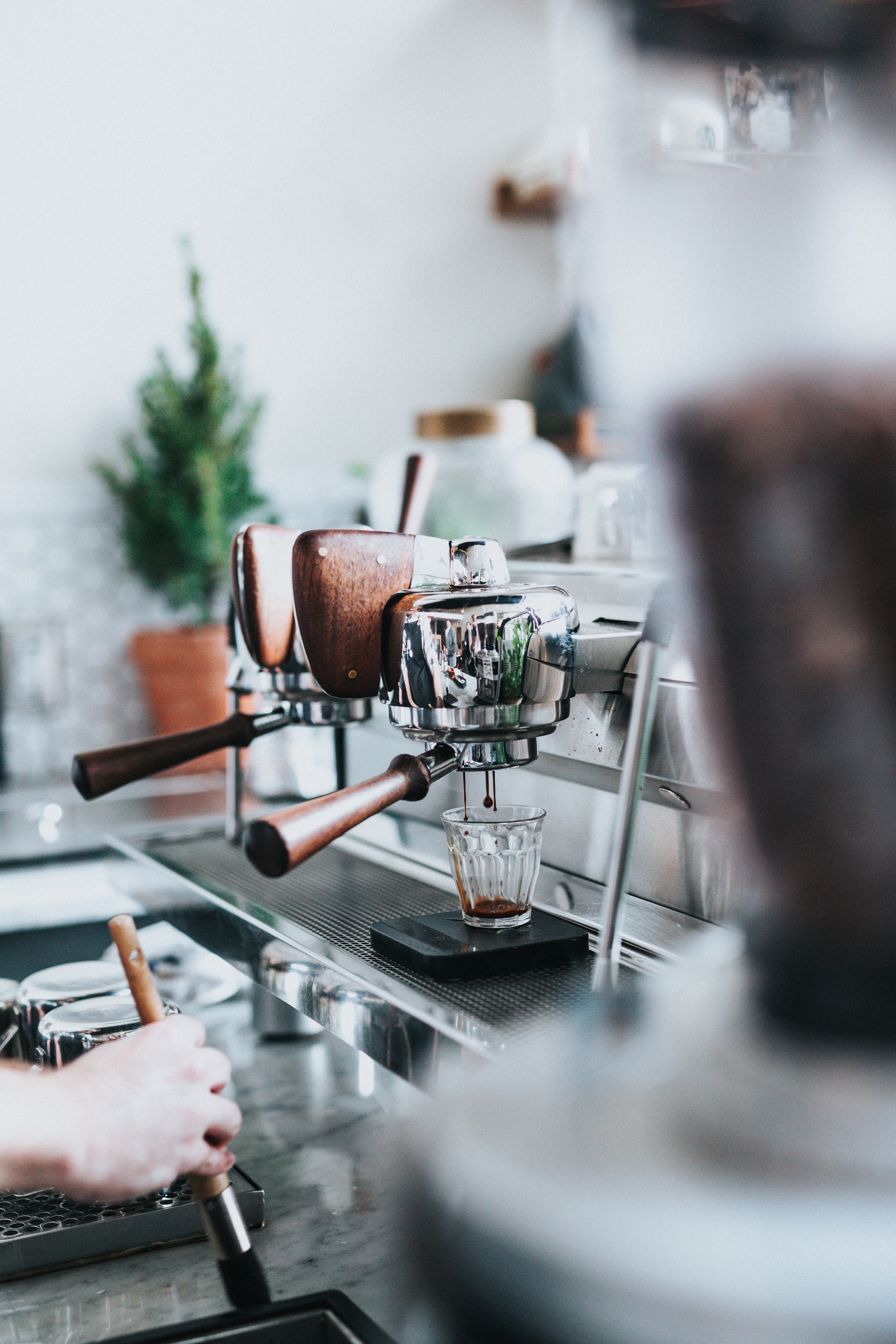 coffee machine in the process of making an espresso